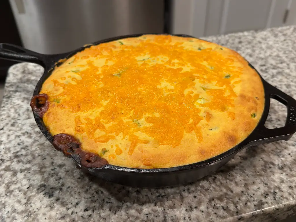 cornbread chili pie in an 11-inch skillet